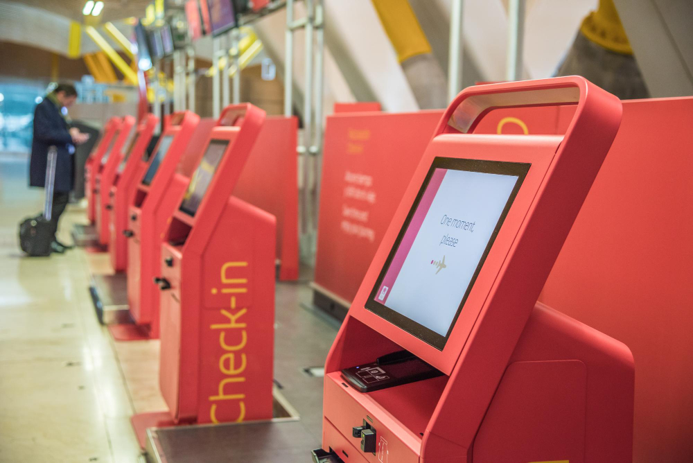 red-self-machines-checkin-service-airport-kiosk